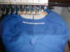 Cap on machine with stitches
